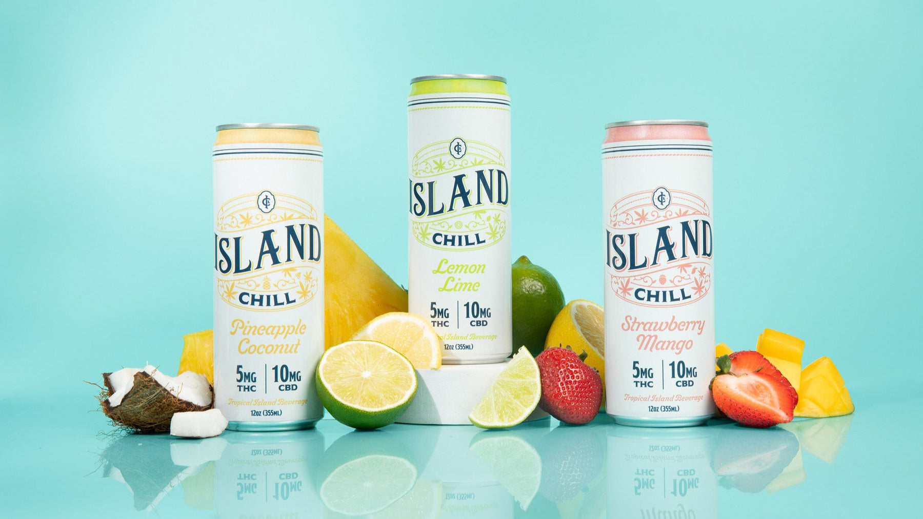 Three cans of Island Chill drinks with fruits on a light blue background